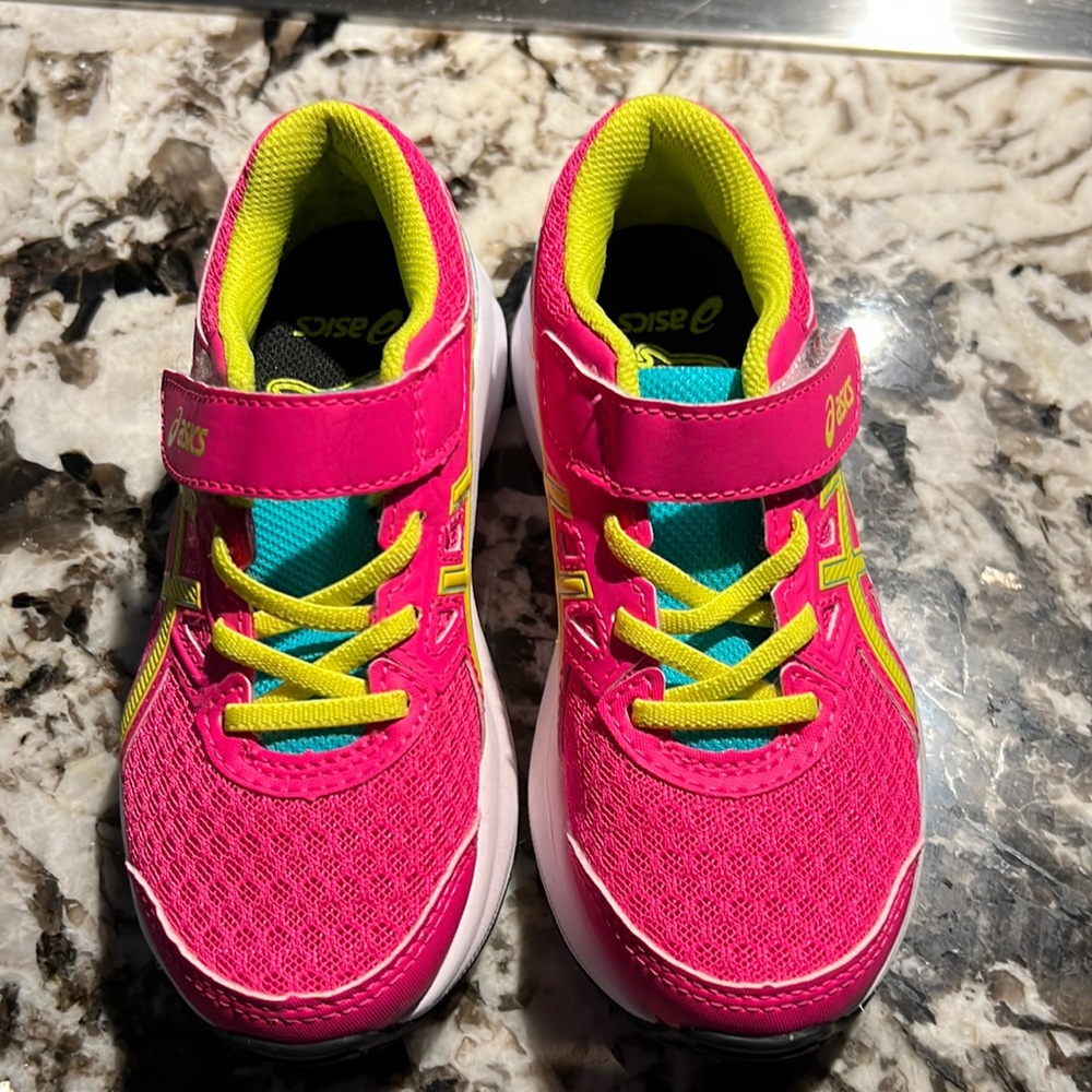 NBW ASICS girls sneaker.  Pink, yellow and teal.  Velcro closure.